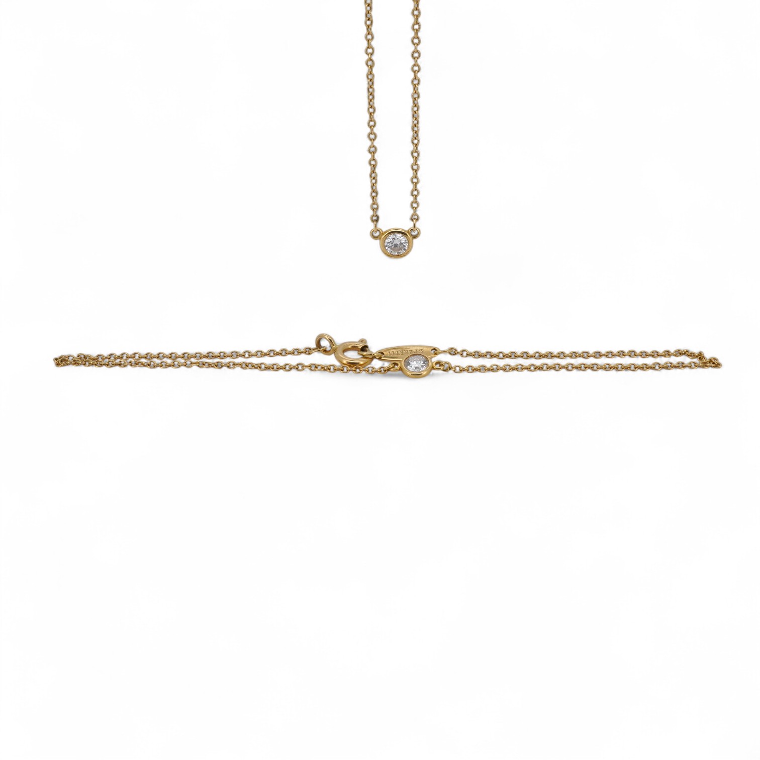 Elsa Peretti for Tiffany and Co., an 18ct gold and diamond 'Diamonds by the Yard' necklace and and bracelet, circa 2016, each composed of a spectacle-set brilliant-cut diamond weighing approximately 0.10 carats, to a fin
